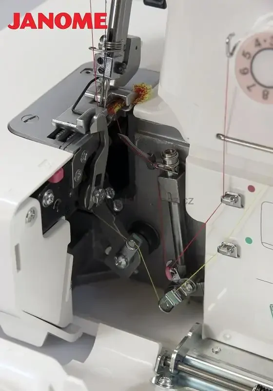 overlock JANOME 990D + 4 patky a vodič